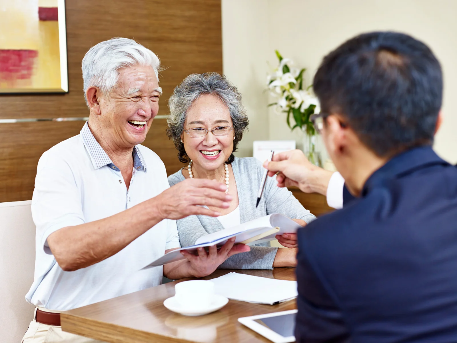 A couple talking through their options with an advisor